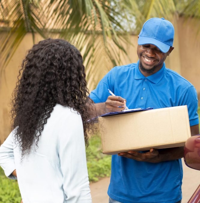 close-up-delivery-person-giving-parcel-client